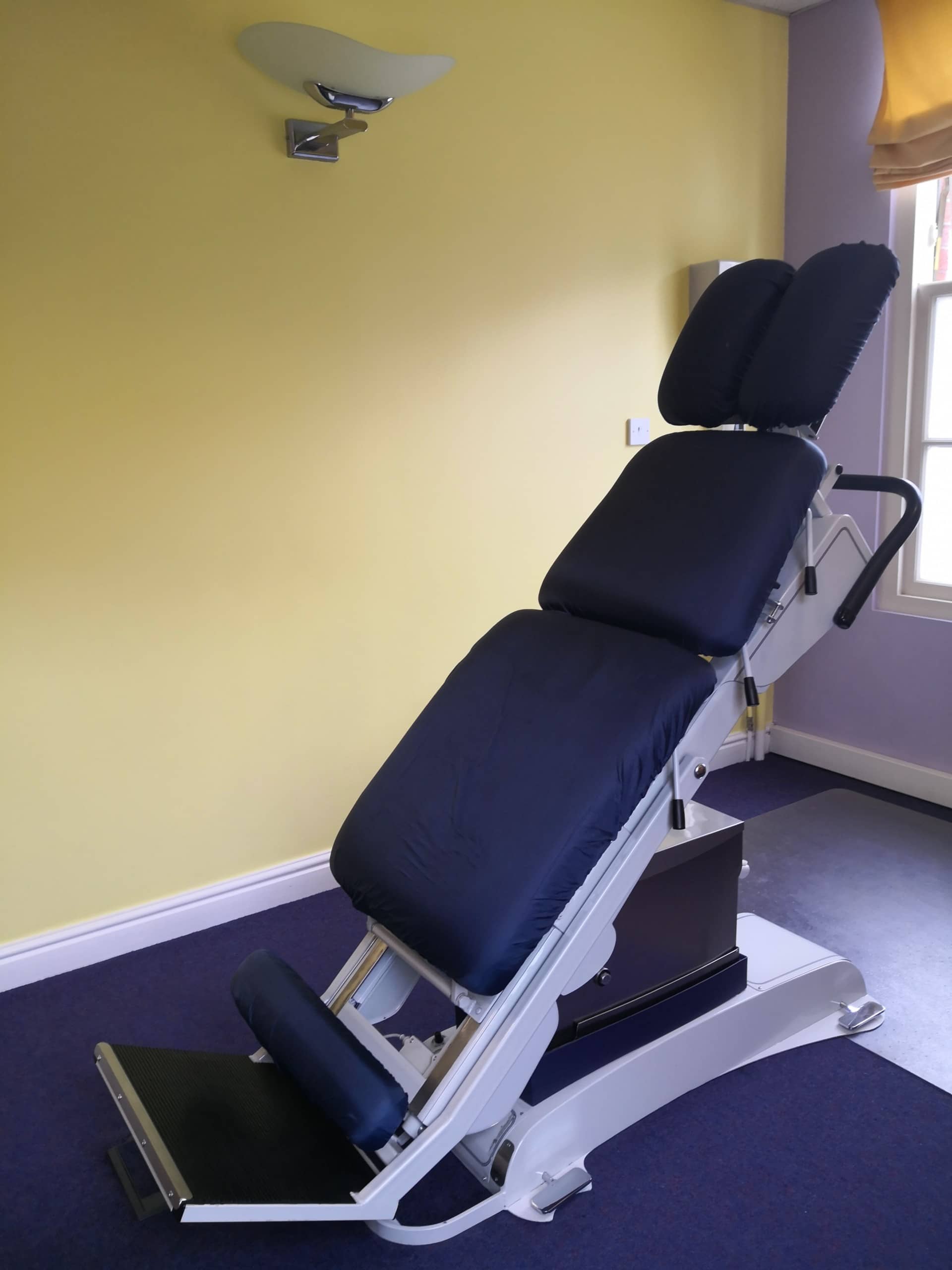 Chiropractic table going up